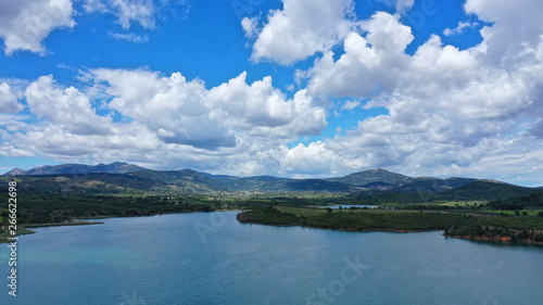 Aerial drone panoramic view of famous dam and lake of Marathon with beautiful clouds  North Attica  Greece