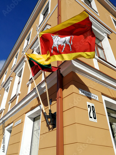 Lithuania and Kaunas city flag on the builind wall photo