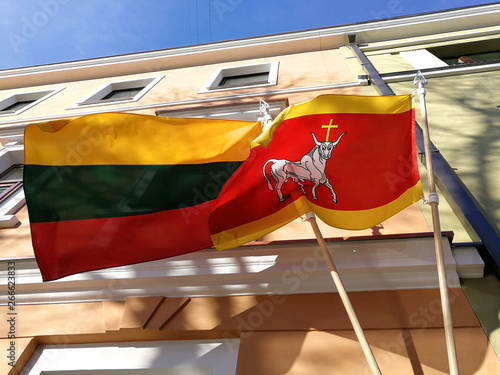 Lithuania and Kaunas city flag on the builind wall photo