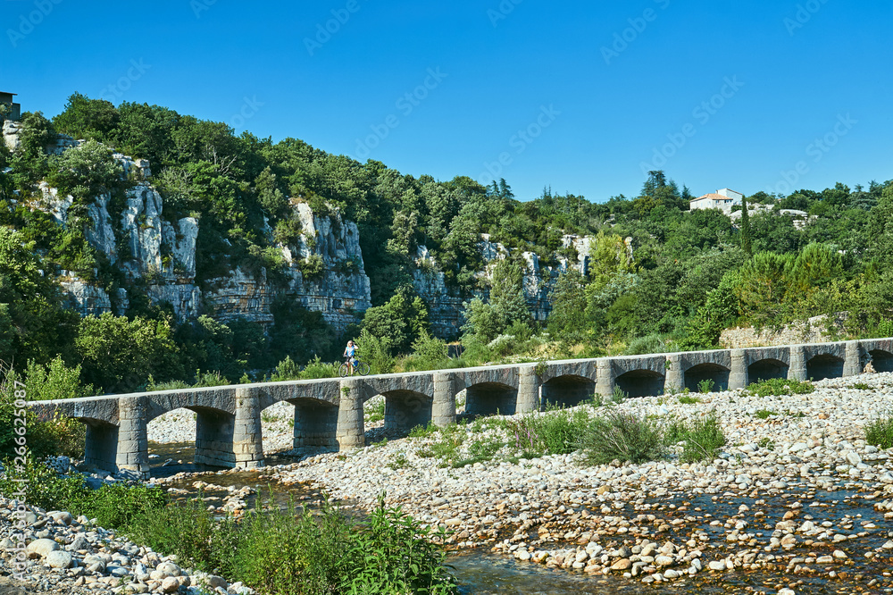 Medieval stone bridge in the Ardeche ravine in France.