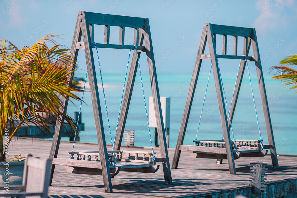 Summer empty outdoor cafe at exotic island on the seashore Summer empty outdoor cafe at exotic island on the seashore