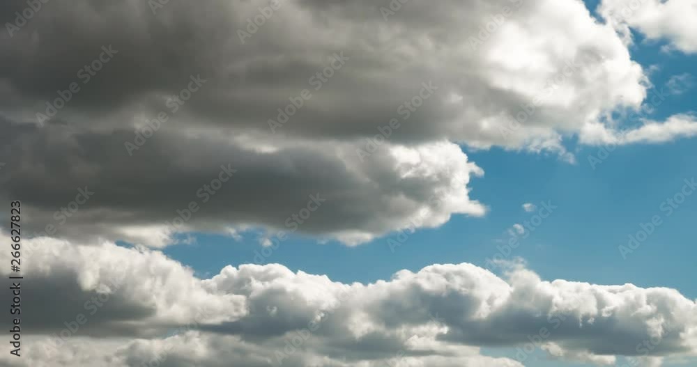 Time lapse clip of several fluffy curly rolling cloud layers in windy weather Time lapse clip of several fluffy curly rolling cloud layers in windy weather