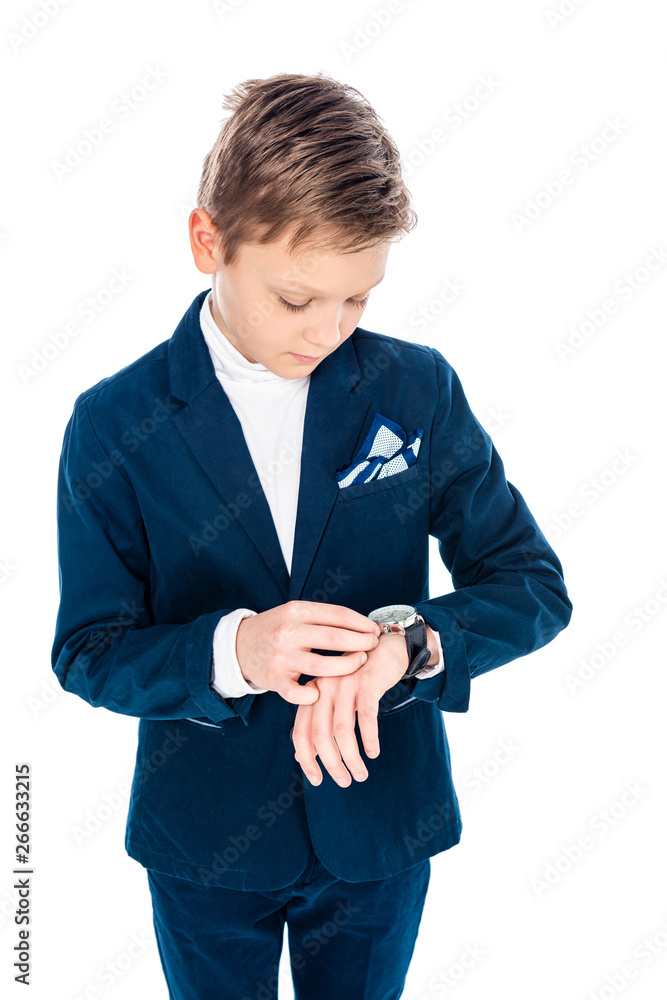 schoolboy in formal wear pretending to be businessman adjusting watch Isolated On White schoolboy in formal wear pretending to be businessman adjusting watch Isolated On White