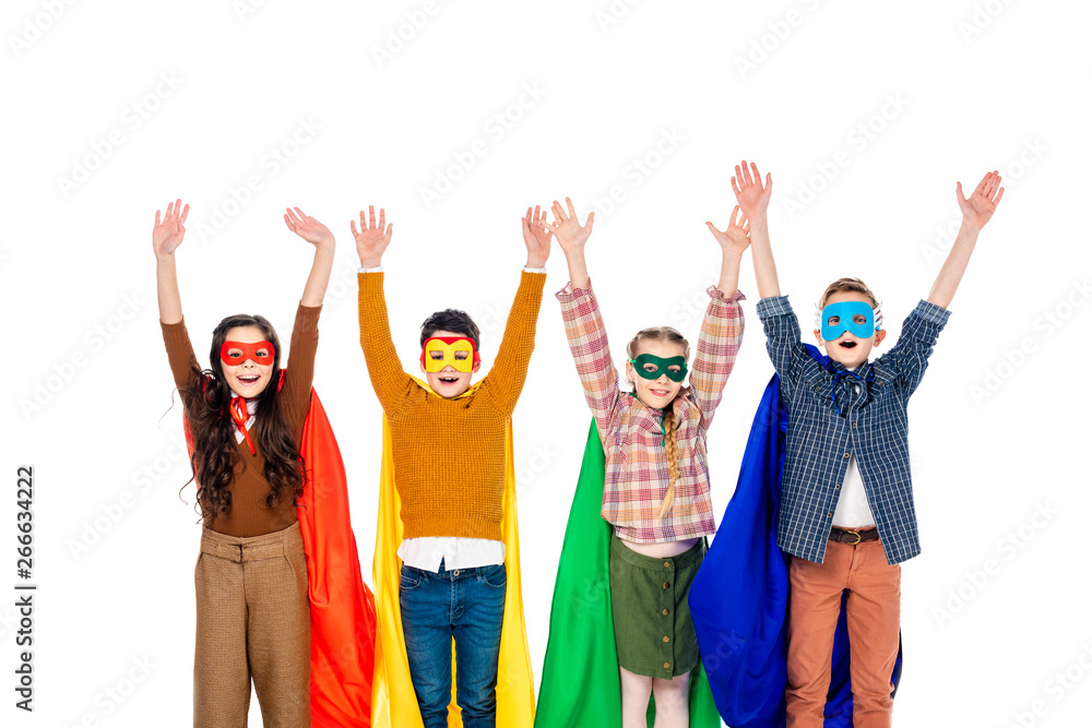 excited kids in superhero costumes and masks with Raised Hands isolated On White