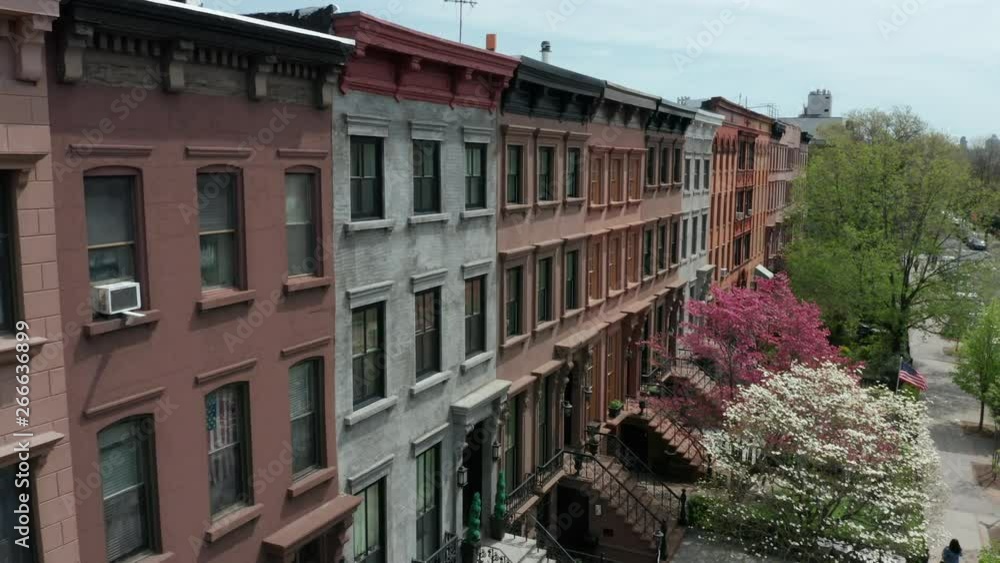 flying along block of brownstones in Carroll Gardens brownstones & tilting down flying along block of brownstones in Carroll Gardens brownstones & tilting down