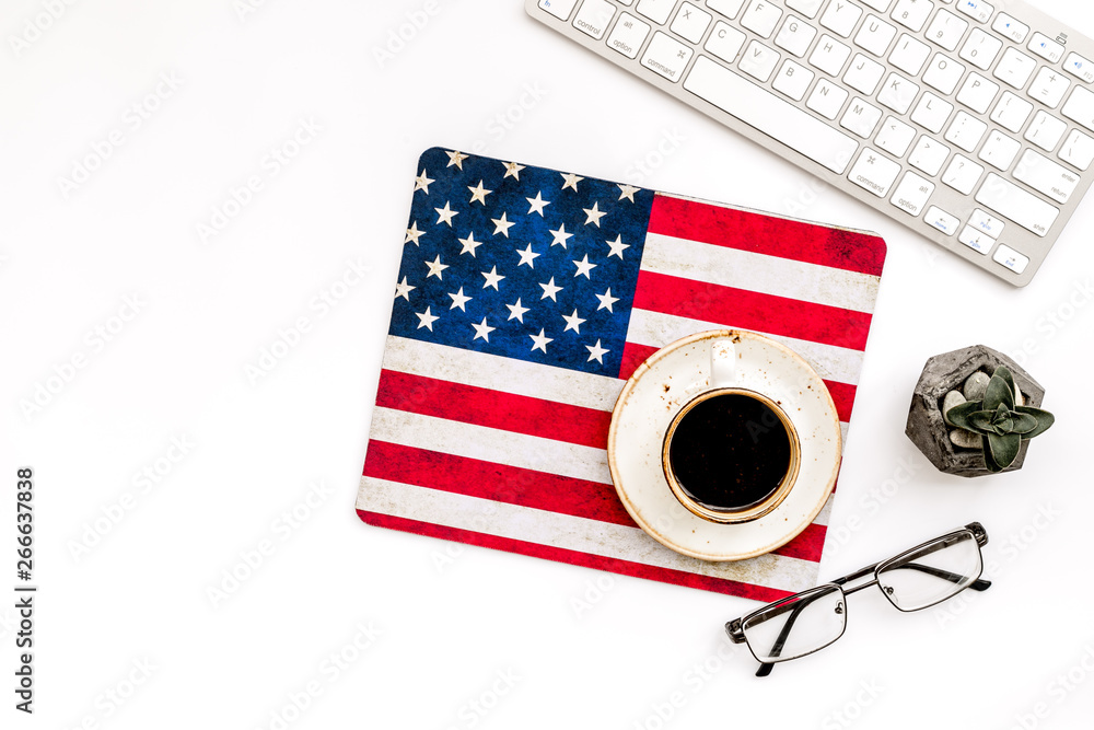 Obraz premium Memoral day of United States of America with flag, keyboard, glasses and coffee on white background top view