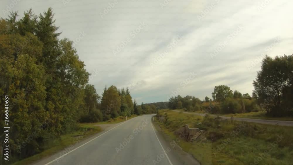 Speed view of a Norwegian rural road Speed view of a Norwegian rural road