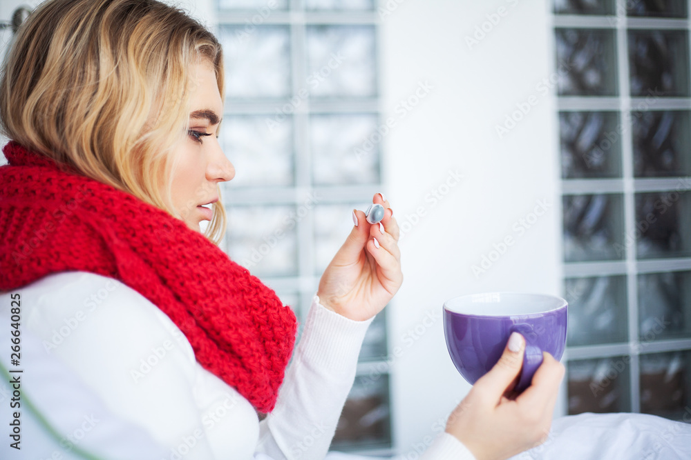 Fever And Cold. Portrait Of Beautiful Woman Caught Flu, Having Headache And High Temperature. Closeup Of Ill Girl Covered In Blanket, Feeling Sick Holding Thermometer. Health care. High Resolution