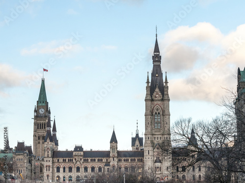 Main clock tower of the center block of the Parliament of Canada  in the Canadian Parliamentary complex of Ottawa  Ontario. It is a major kandmark   containing the Senate and the house of commons