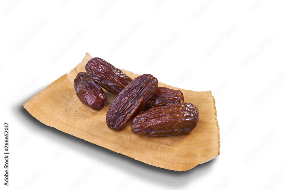 sweet dried dates fruit on dried banana leaf sweet dried dates fruit on dried banana leaf