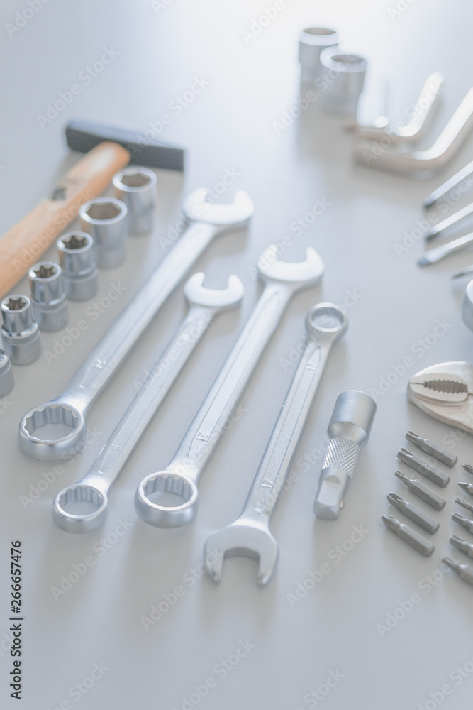 Background of a variety of tools for a construction worker on gray colour. Background of a variety of tools for a construction worker on gray colour.