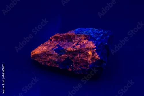 Принти на полотні Hackmannite fluorescent mineral under UV light