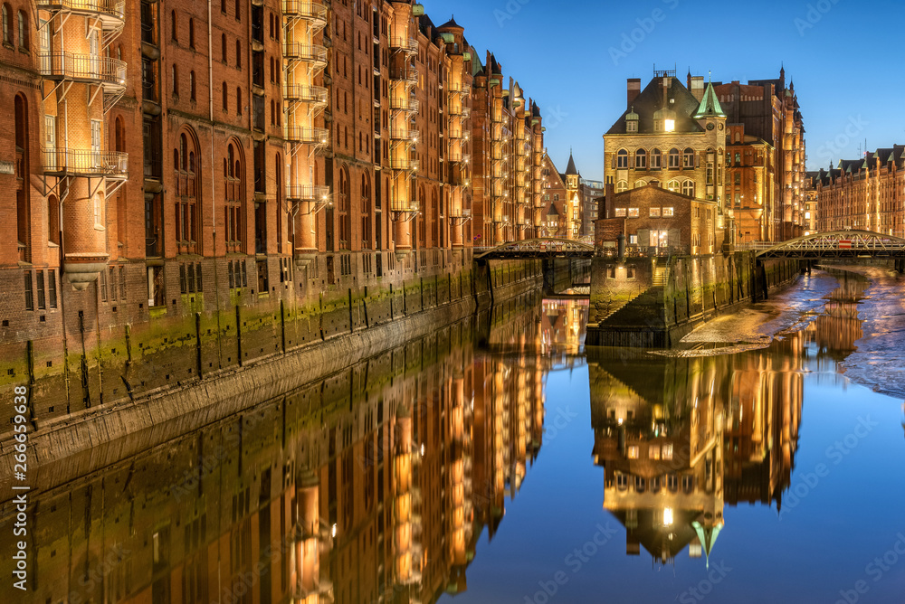 Old warehouses at the Speicherstadt in Hamburg, Germany, at dusk