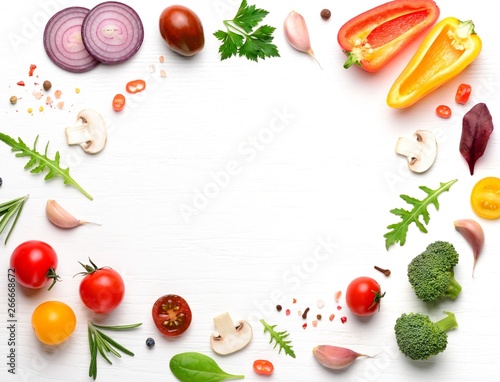 Vegan ingredients for homemade pizza on white wooden background. Copyspace. Top view .