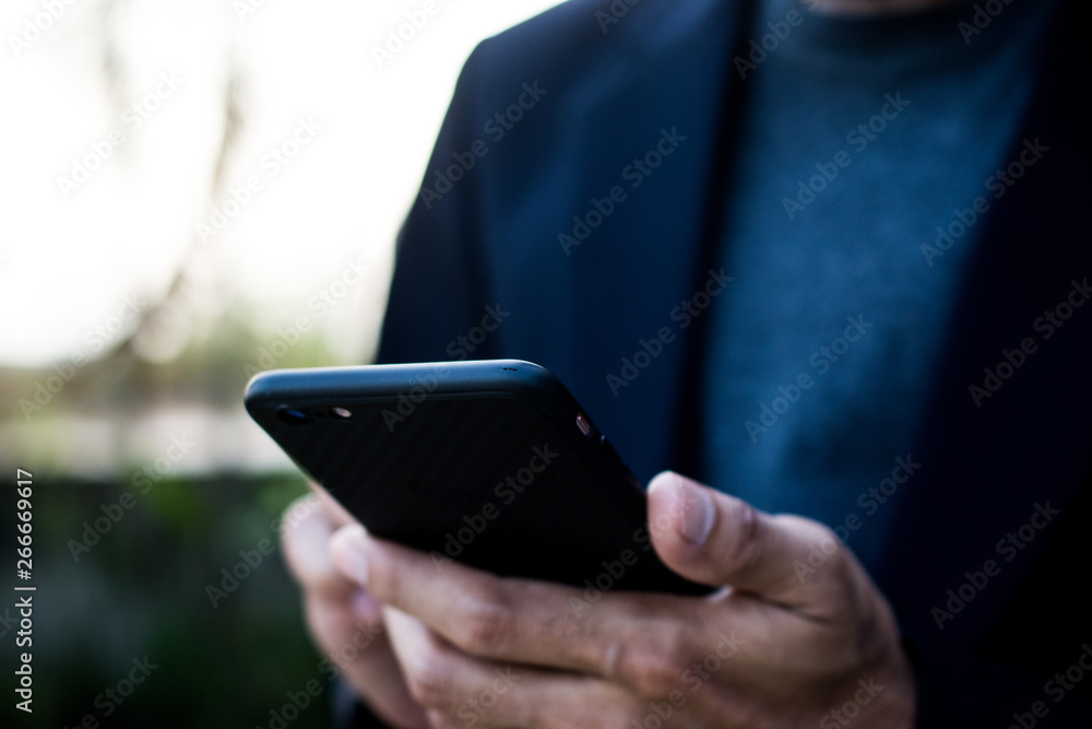 People are holding and using mobile smartphone by internet online technology People are holding and using mobile smartphone by internet online technology