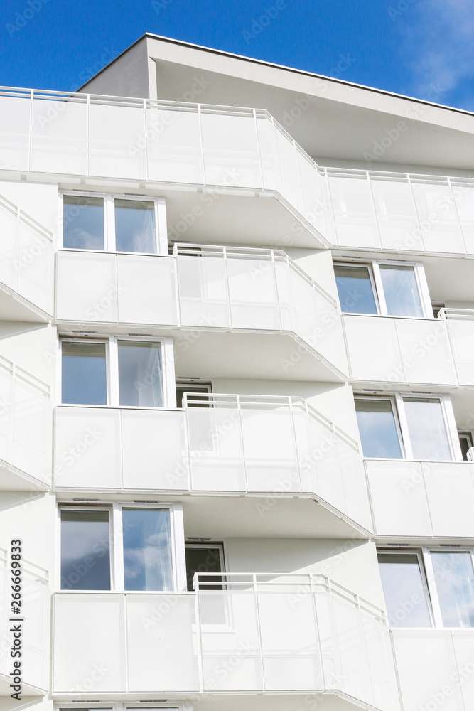 White apartment building White apartment building