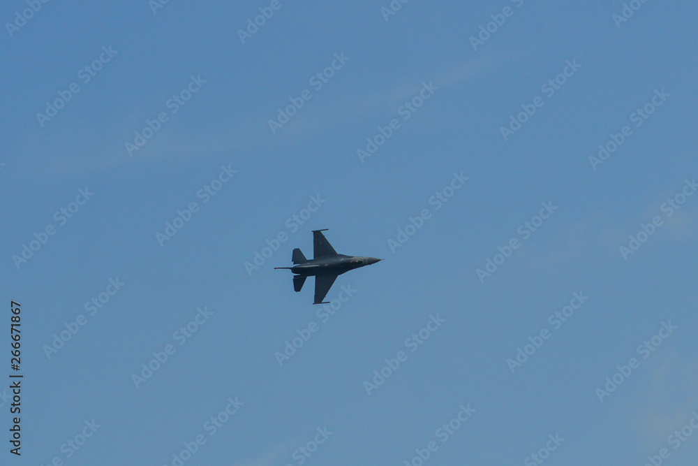 A fighter aircraft flying for display A fighter aircraft flying for display