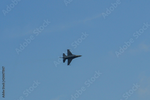 A fighter aircraft flying for display