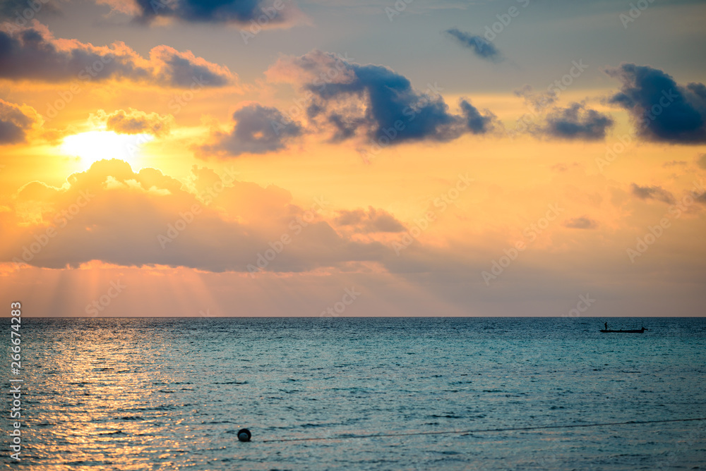 Fototapeta premium Sunrise dramatic sky on sea, tropical desert beach, no people, stormy clouds, travel destination, Indonesia Banyak Islands Sumatra