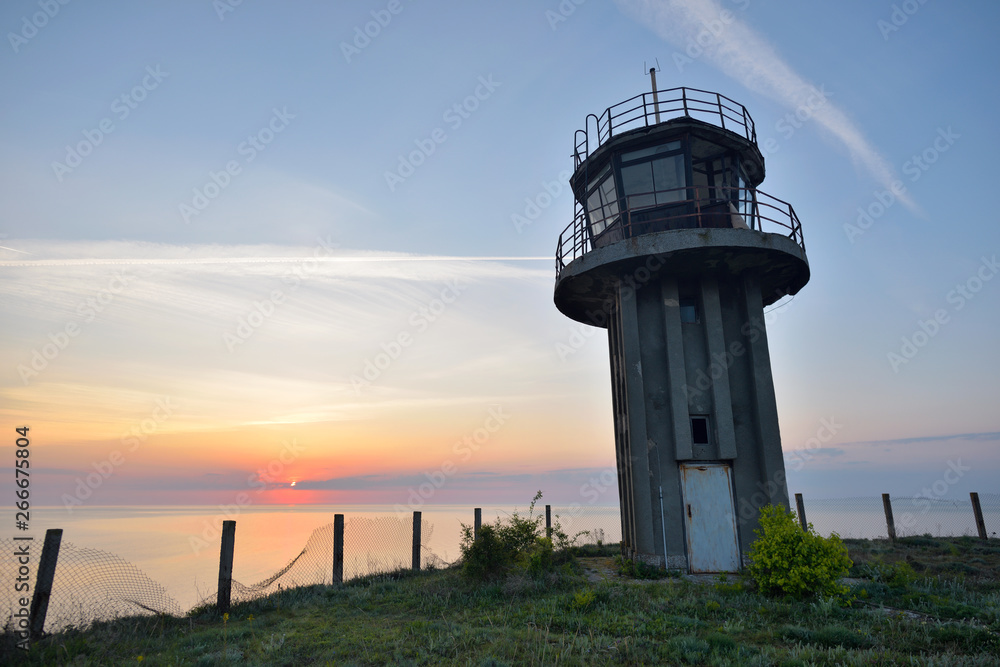 Watctower in Sunrise light at Black Sea, on Bulgarian coastline Watctower in Sunrise light at Black Sea, on Bulgarian coastline