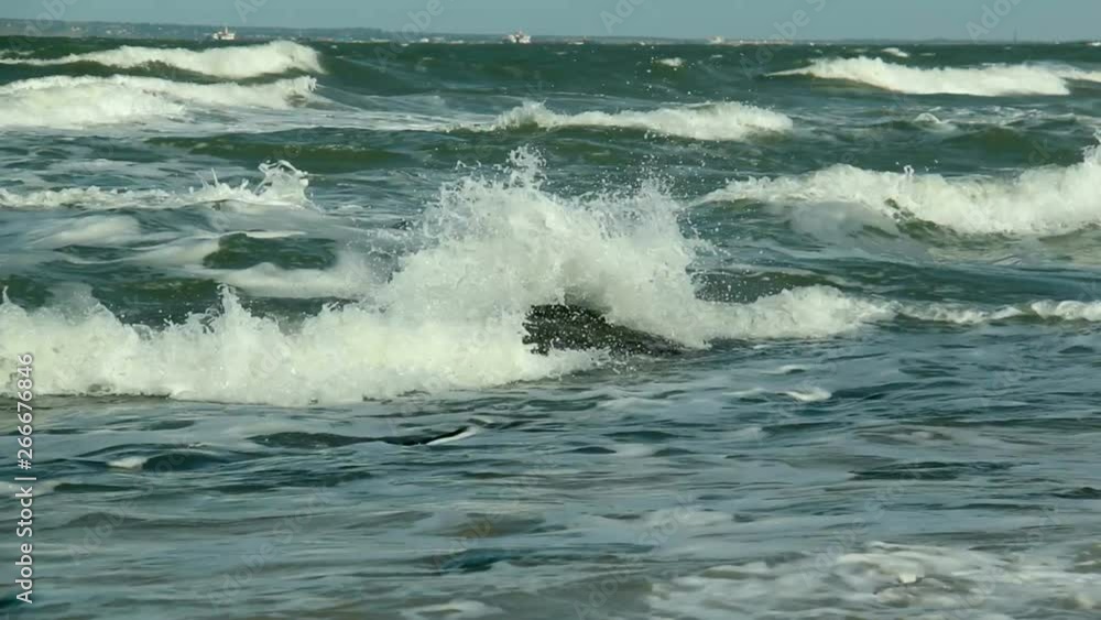 Sea waves breaking on the rocks. The coast of the Black Sea. Kerch Strait. Sea waves breaking on the rocks. The coast of the Black Sea. Kerch Strait.