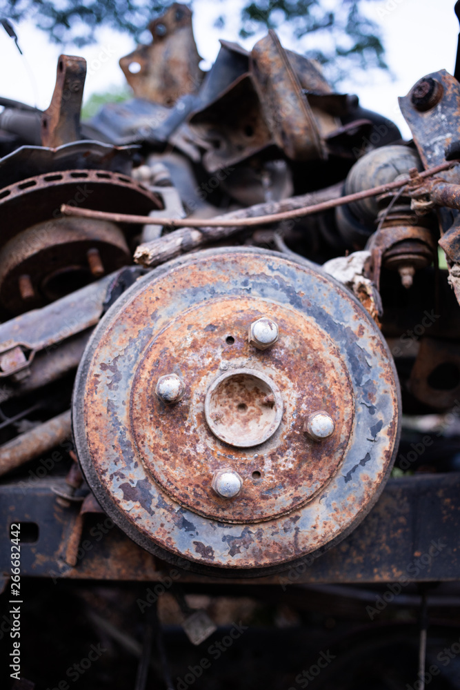 Parts of used cars sitting in junkyard