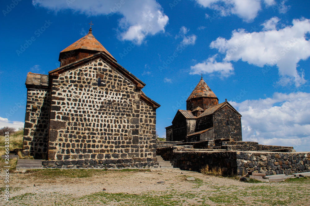 Fototapeta premium Sevanavank (Sevan Monastery) is a monastic complex located on a peninsula on the shore of Lake Sevan in the Gegharkunik region of Armenia. An ancient Christian shrine.