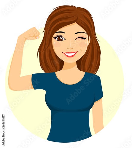 Young girl posing in a strong pose showing bicep.