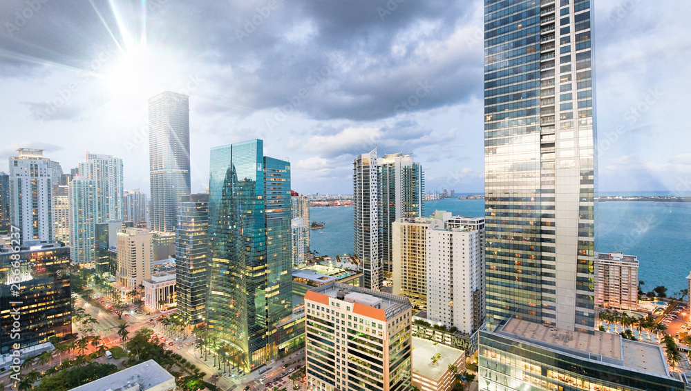 Obraz premium Amazing night skyline of Downtown MIami. Wide angle view of city skyscrapers on a cloudy morning
