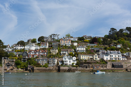Historic English town of Dartmouth Devon with houses on the hillside and River Dart