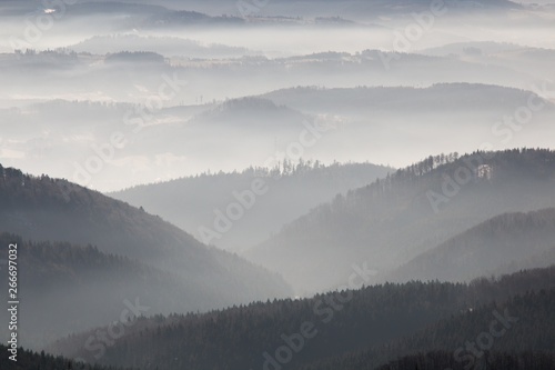 Foggy morning hills in winter 