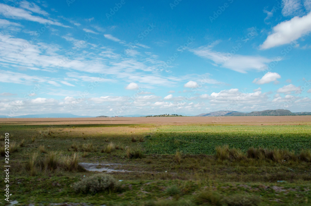 landscape with blue sky and clouds