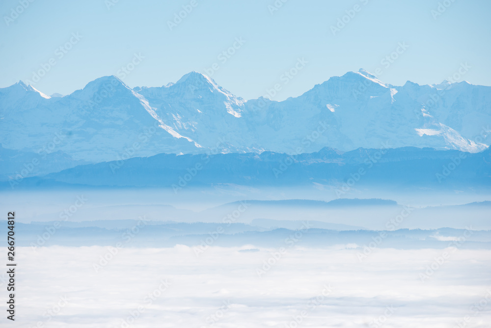sea of fog with alps over swiss Mittelland seen from Grenchenberg with Eiger, Mönch and Jungfrau
