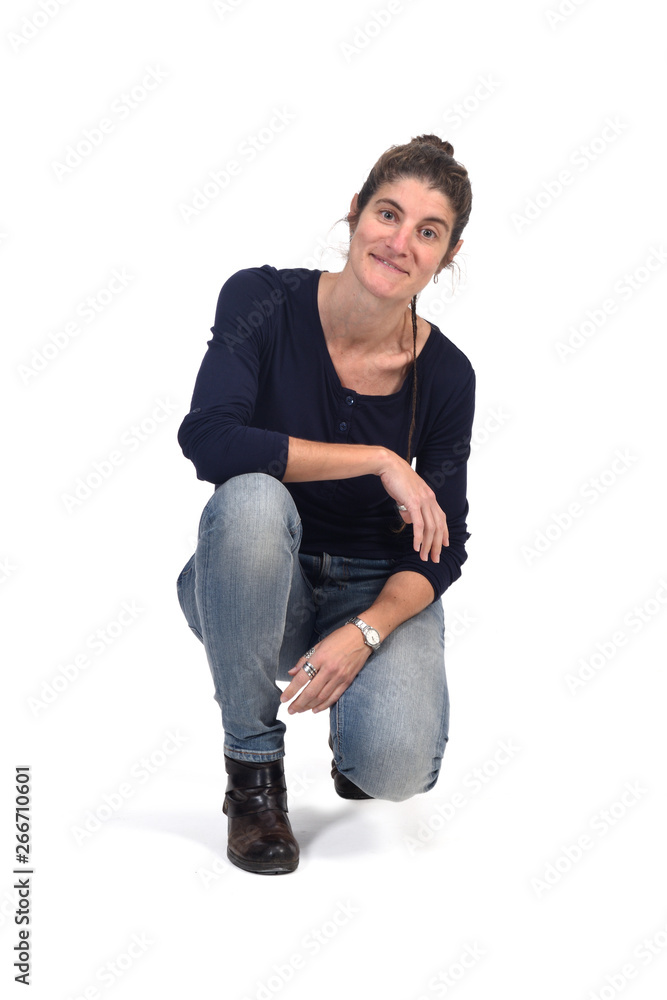 full portrait of woman sitting in the floor on white full portrait of woman sitting in the floor on white