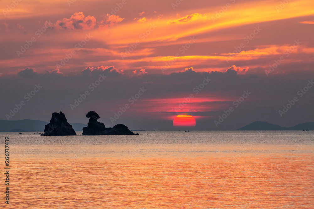 The sun is falling at the tropical sea, Thailand.