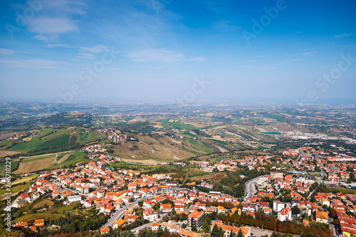 Fototapeta Naklejka Na Ścianę i Meble -  Modern San Marino Suburban districts and hills view from above.