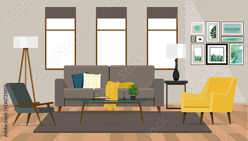 Interior design  of the living room with a sofa and two armchairs on the background of a wall with windows. 