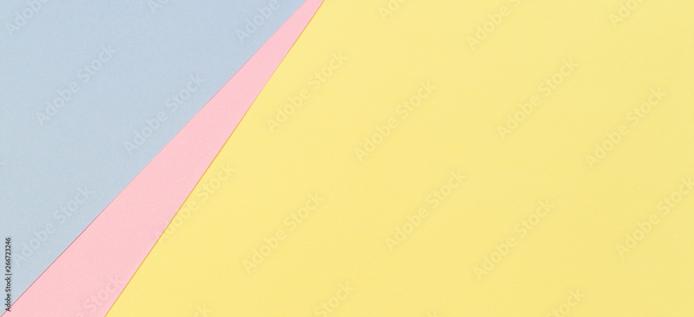 Abstract geometric shape pastel yellow, pink and blue color paper background