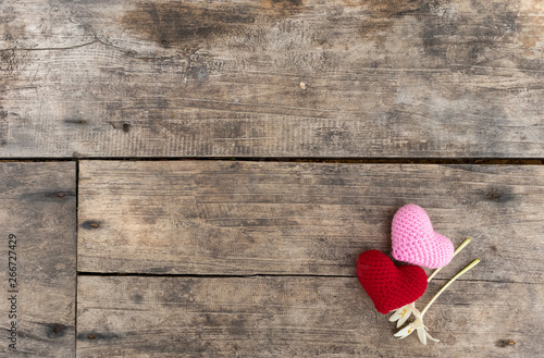 Hearts and flowers on the wooden table photo