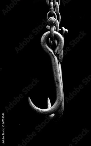 old metall chain hook on black background