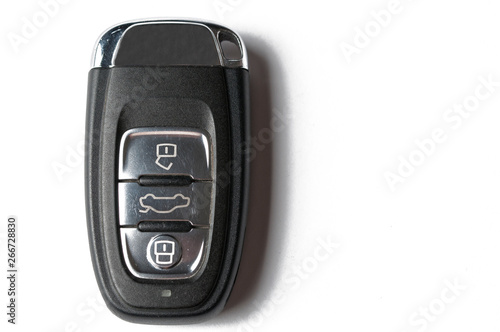 Black key from a car isolated on a white background. Car key