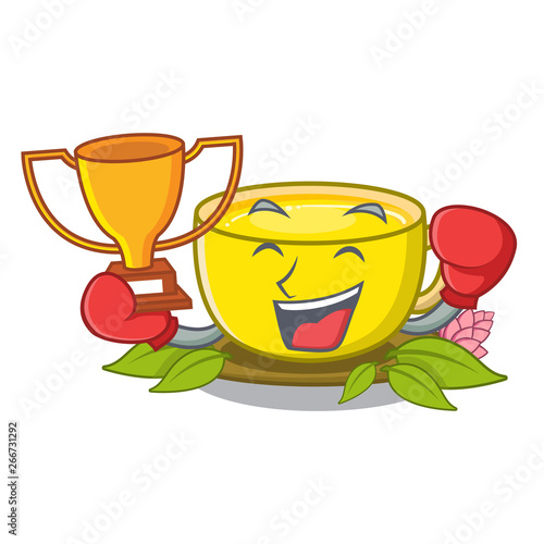 Boxing winner turmeric tea above mascot wood table