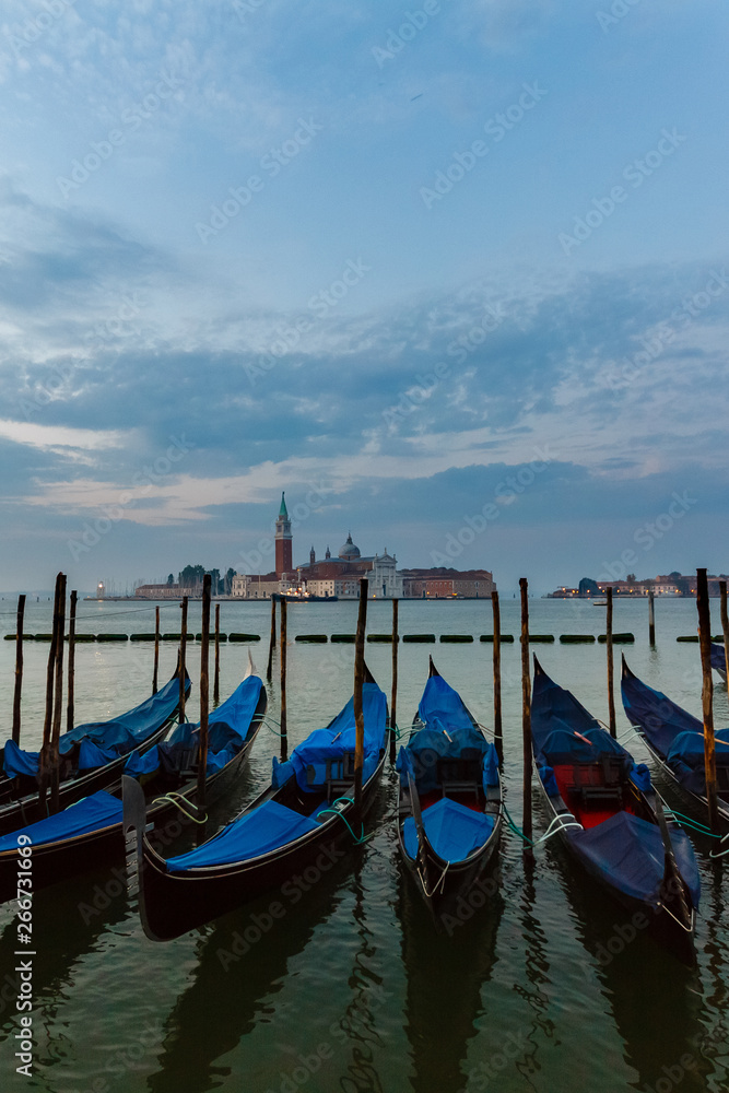 Gondolas moored on the Grand Canal, Venice, Italy