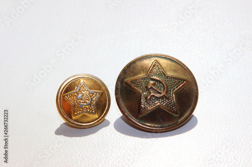 A lot of multicolored different size old buttons