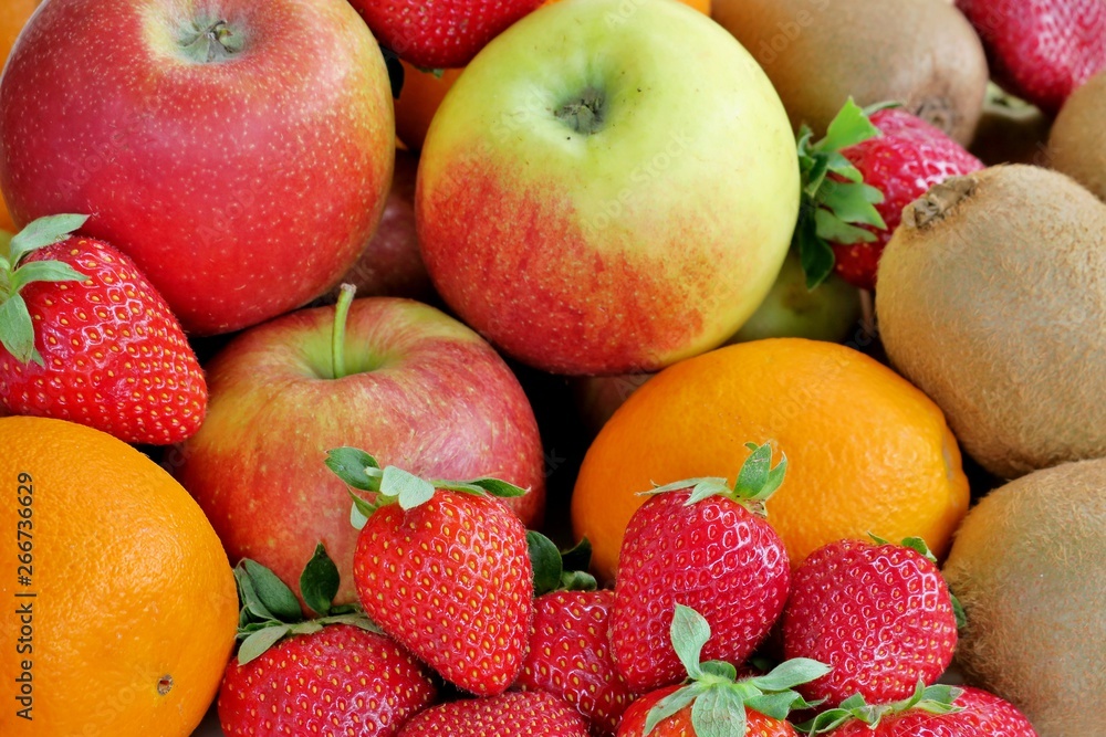 ripe juicy healthy fruits of different colors close up 