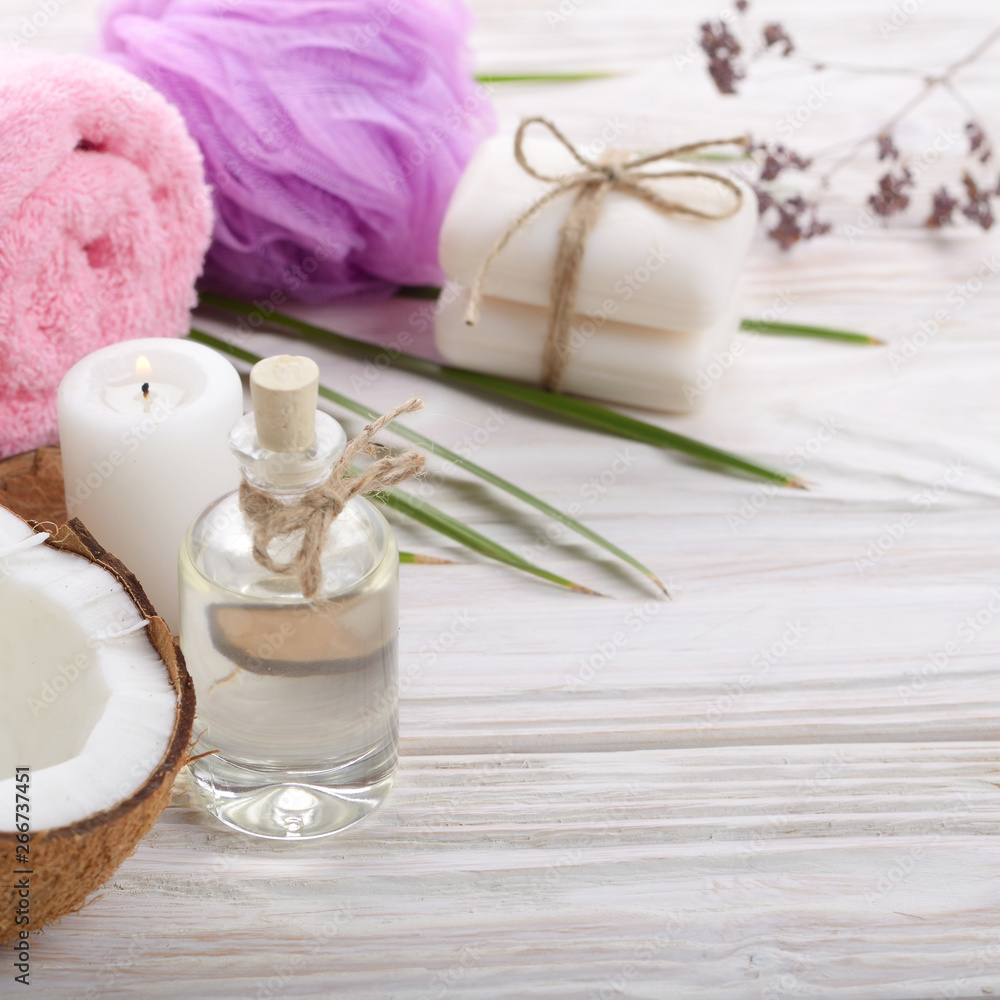 Body care Coconut oil soap and candle set on white table Body care Coconut oil soap and candle set on white table