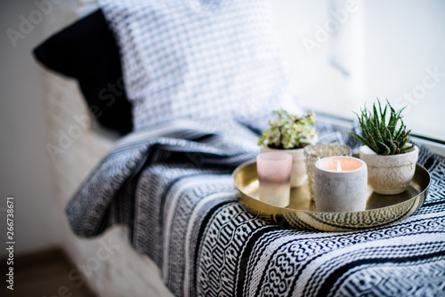 Fotografija Real apartment interior decor, aromatic candles and plants on vintage tray with