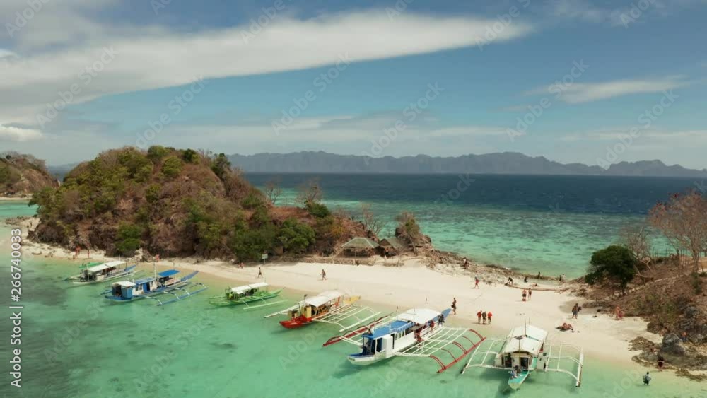 aerial view tropical island with sand white beach. Bulog Dos, Philippines, Palawan. Seascape bay with turquoise water and coral reef. aerial view tropical island with sand white beach. Bulog Dos, Philippines, Palawan. Seascape bay with turquoise water and coral reef.