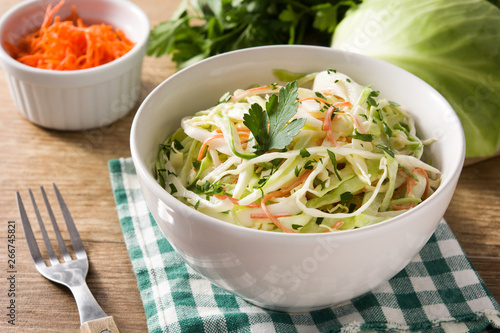 Coleslaw salad in white bowl