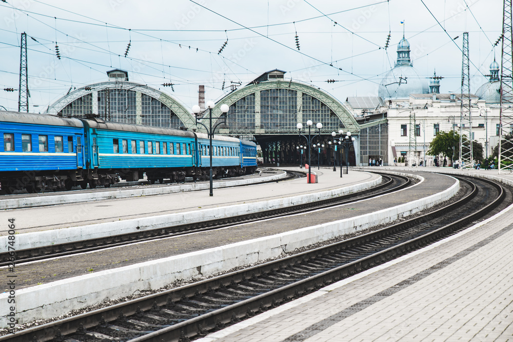Naklejka premium train at railway station. platform